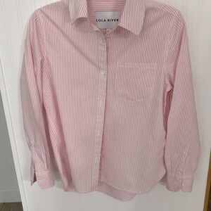 Women’s button down pink and white striped shirt.